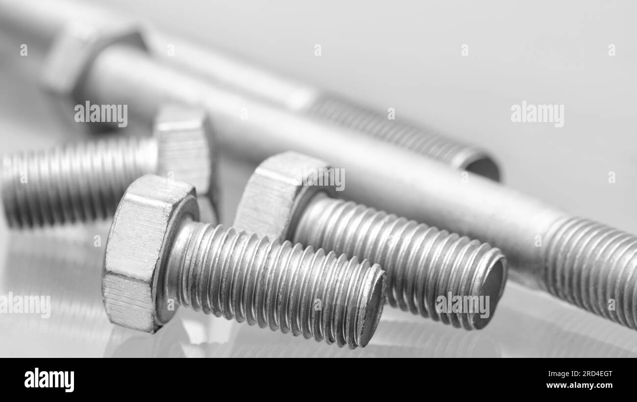 bolts and nut on glass Stock Photo - Alamy