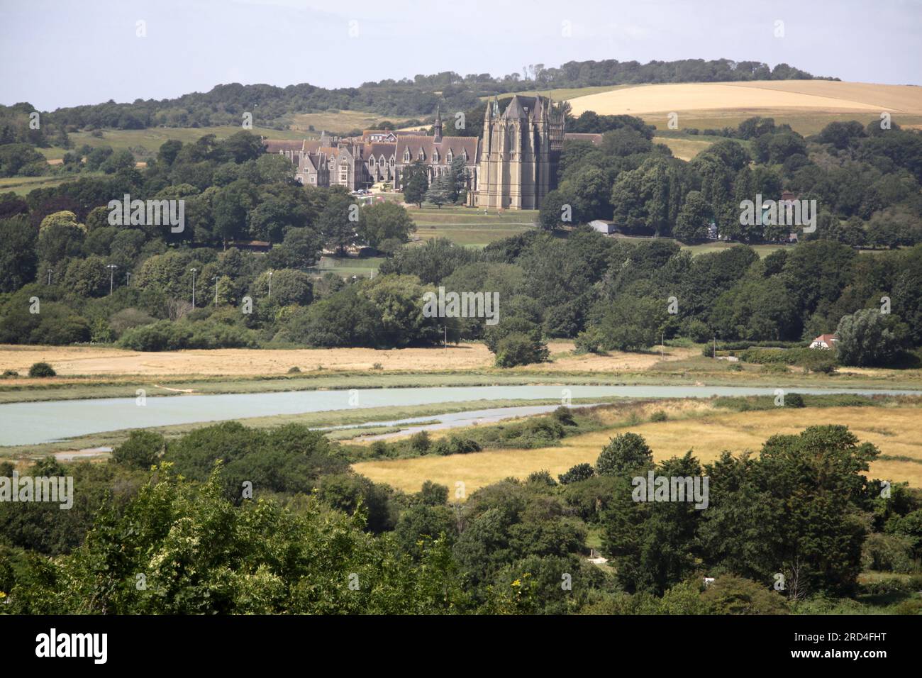 A side view on of Lancing college as seen from the south downs on the opposite bank of the river Adur Stock Photo