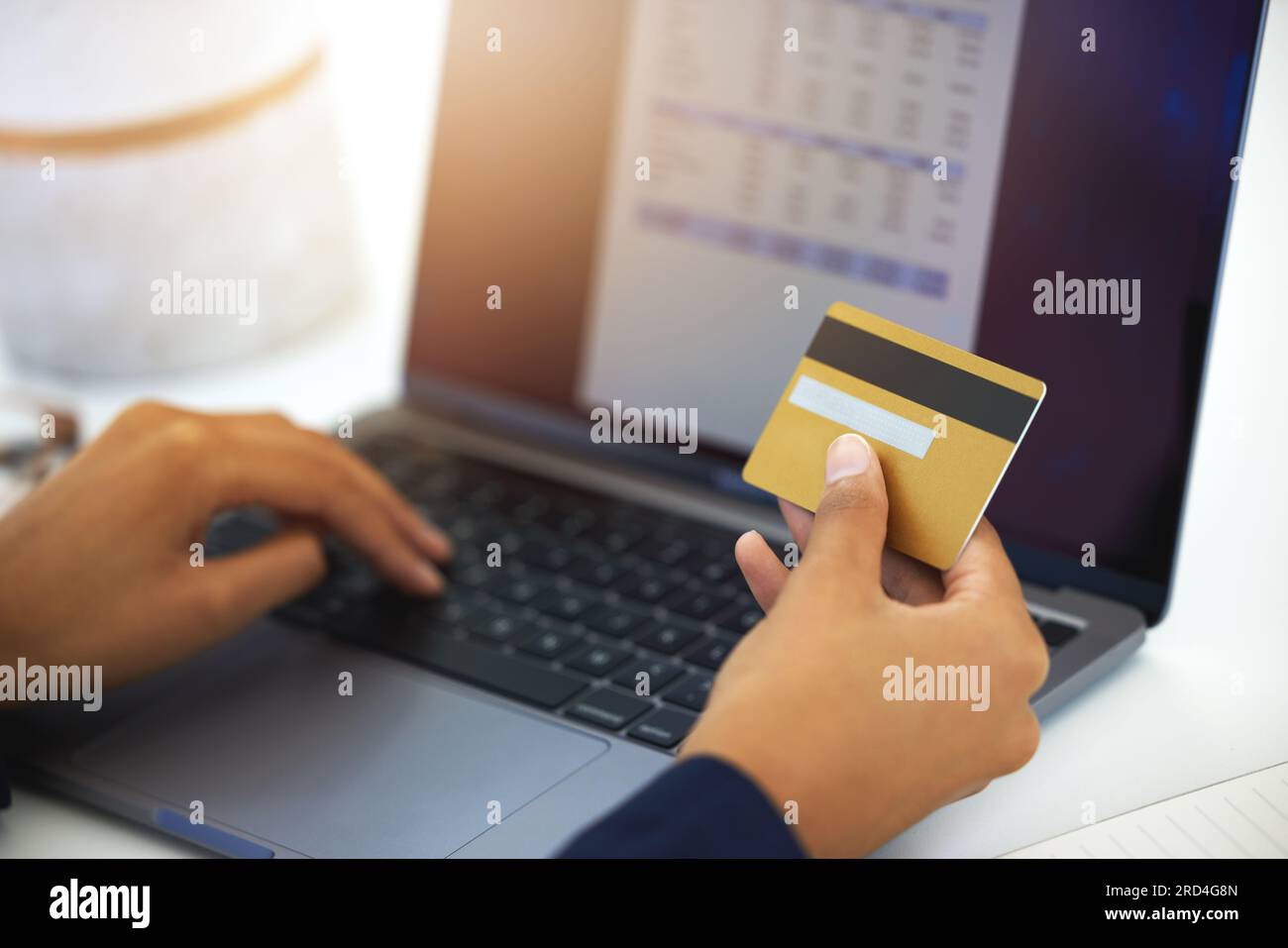 Credit card, laptop and business man hands for invoice, online payment and budget or digital receipt in accounting. Business person on computer screen Stock Photo
