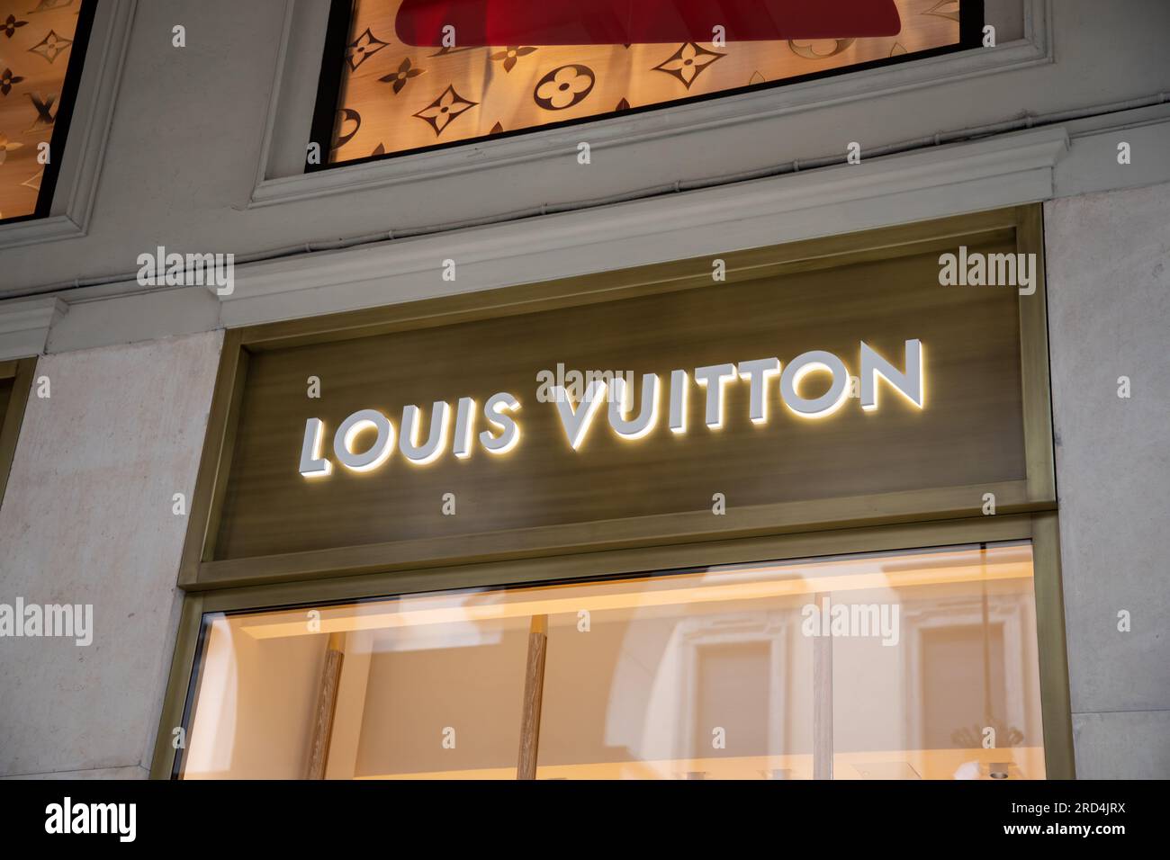 Kyiv, Ukraine. March 3, 2020. Louis Vuitton famous monogram. Multicolored  logo printed on knitted synthetic black fabric. Luxury brand backgrounds  and Stock Photo - Alamy