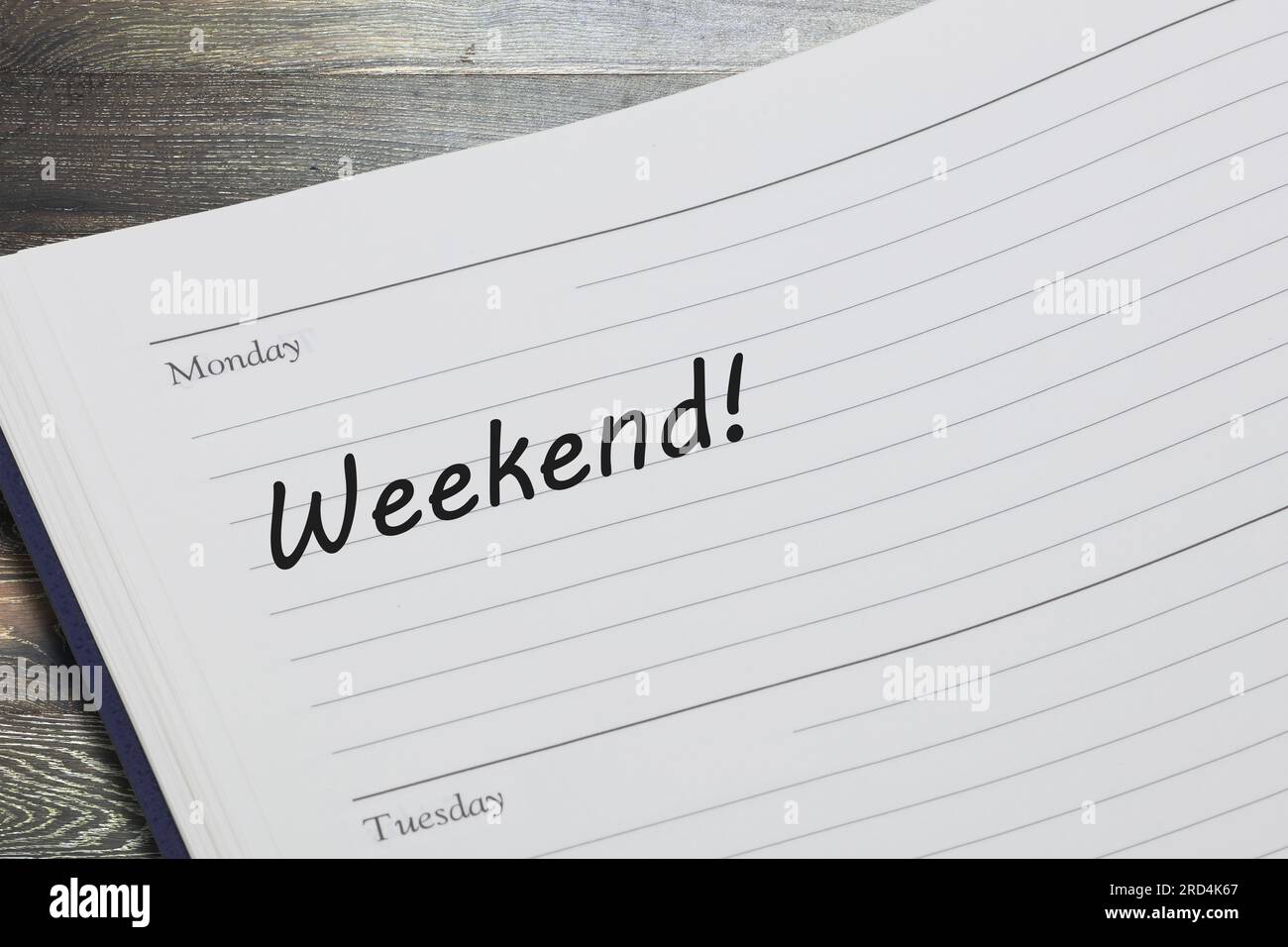 Weekend diary reminder appointment open on desk Stock Photo - Alamy