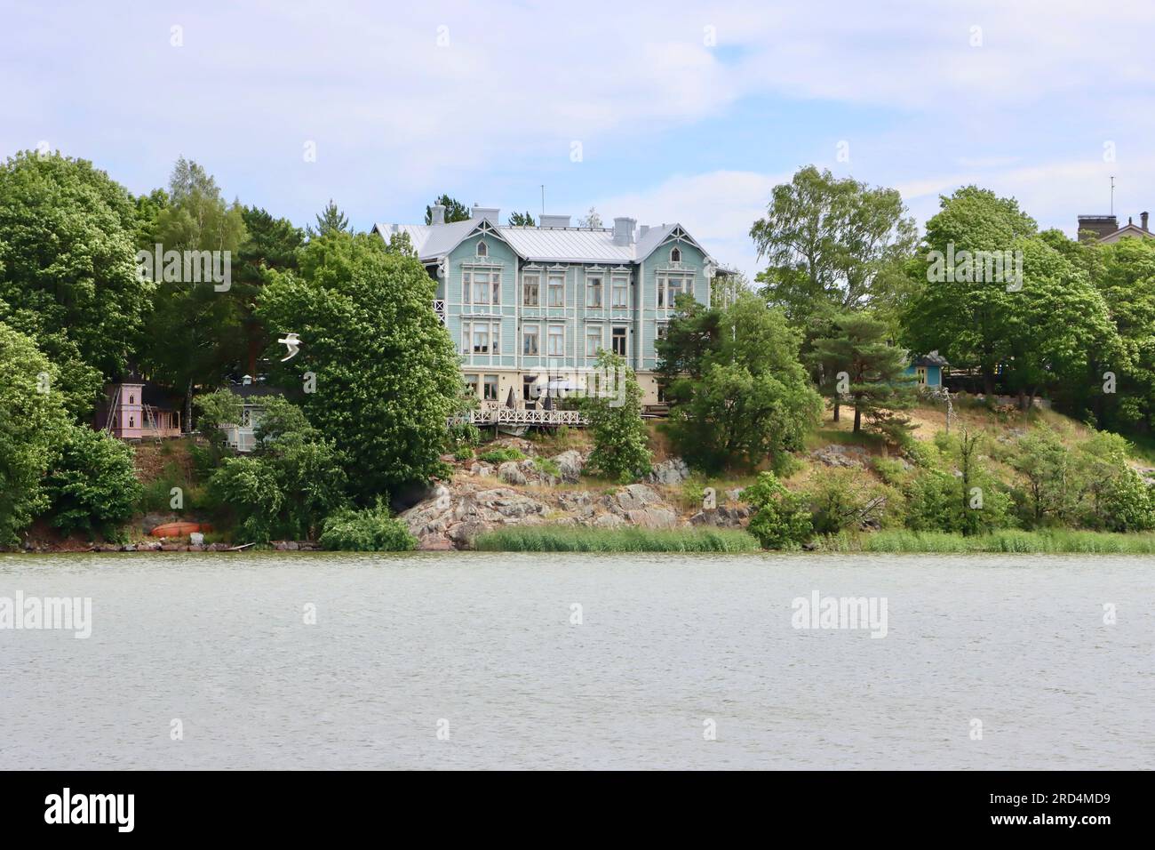 Over water view of old historic house on Töölö Bay in central Helsinki, Finland Stock Photo