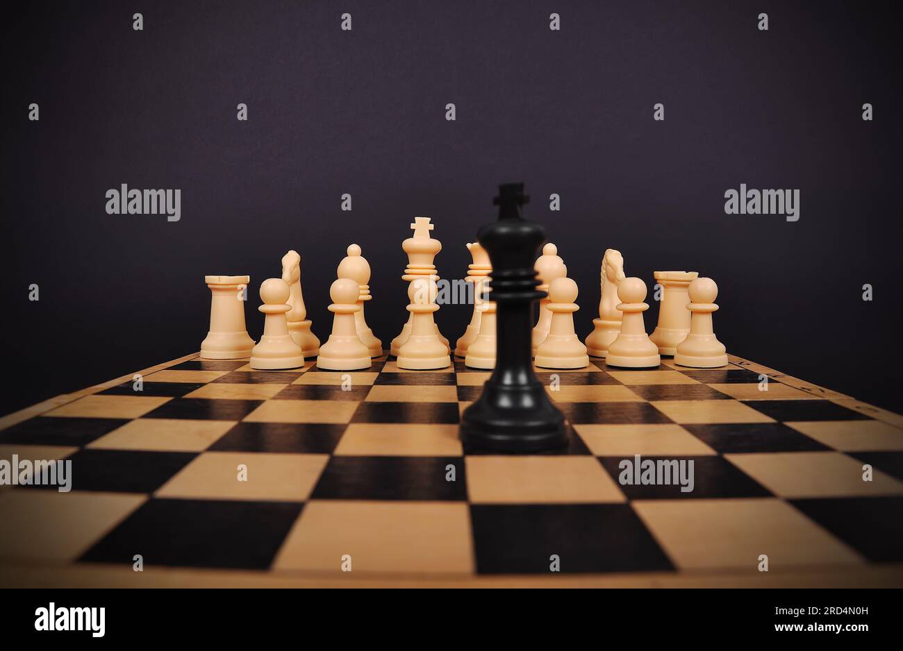 Black Chess King and other chess pieces Stock Photo
