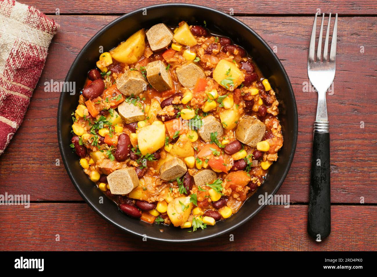 Vegan Cowboy Stew with onion, bell pepper, TVP granules, crushed