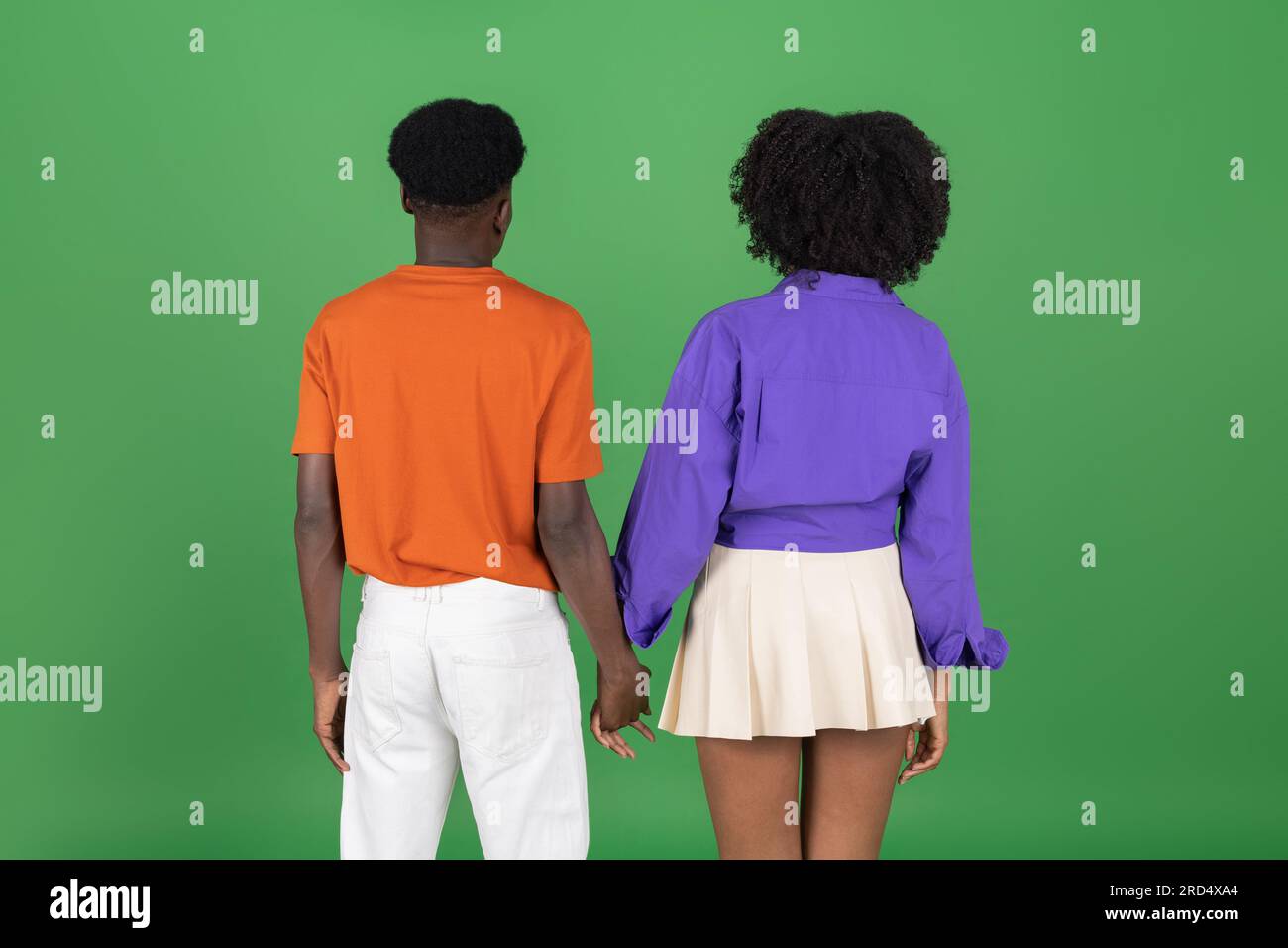 Millennial african american couple in casual holding hands, enjoy ...
