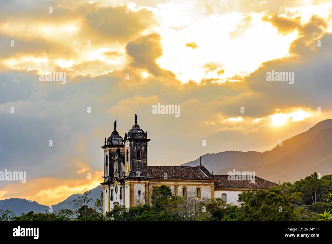 Old church on top of the hill and among the vegetation in the city of Ouro Preto in Minas Gerais Stock Photo