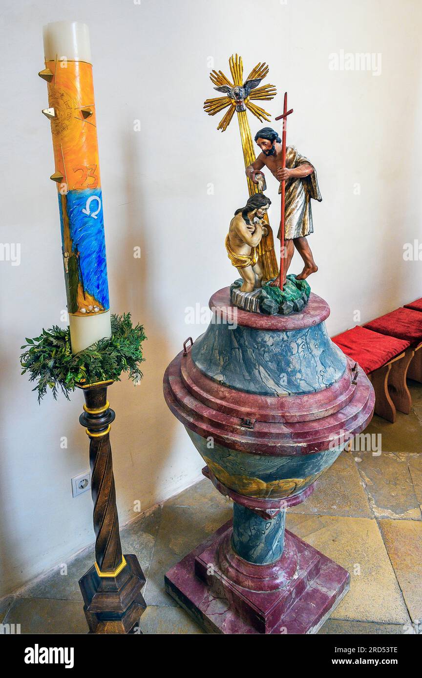 Baptismal font and candle, St. Bartholomew's Parish Church, Hopferbach