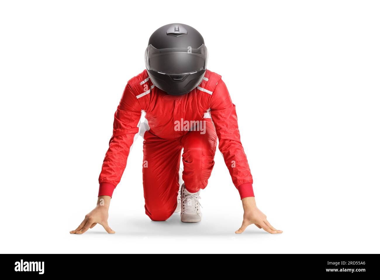 Car racer with a helmet in a start running position isolated on white background Stock Photo