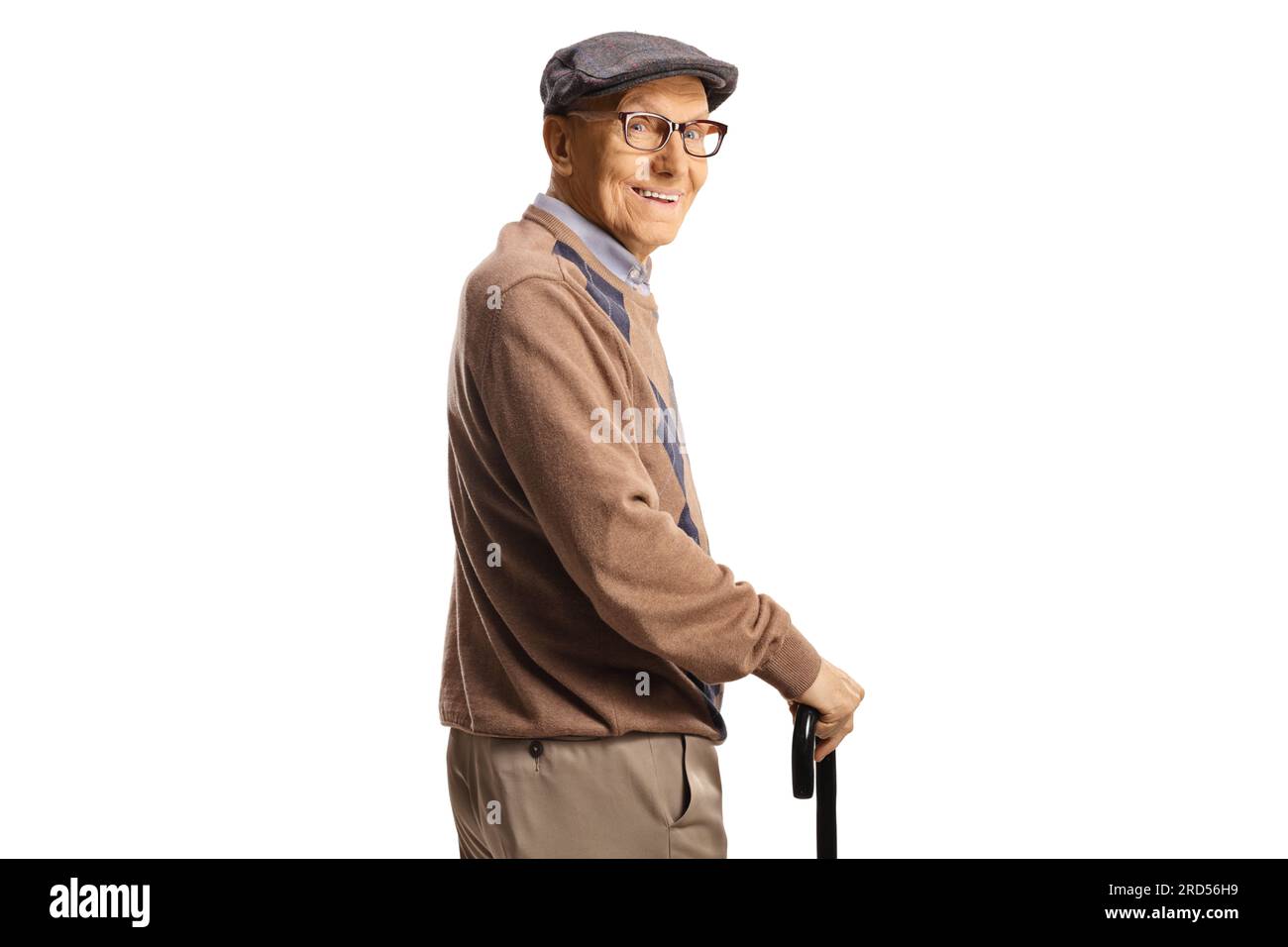 Happy senior man with a cane looking over shoulder isolated on white ...
