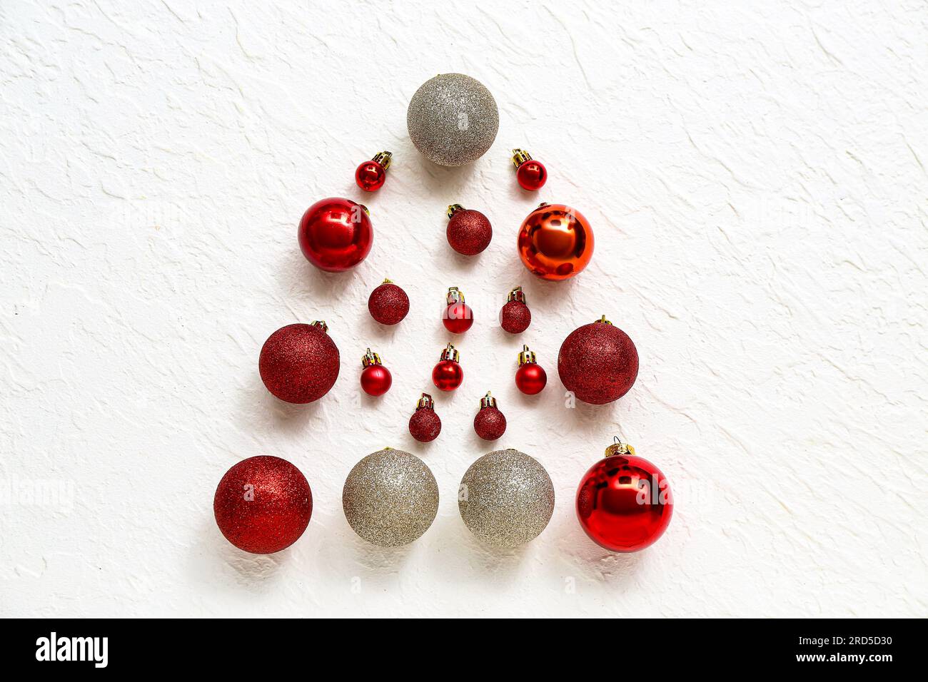 Christmas tree made of balls on white background Stock Photo - Alamy