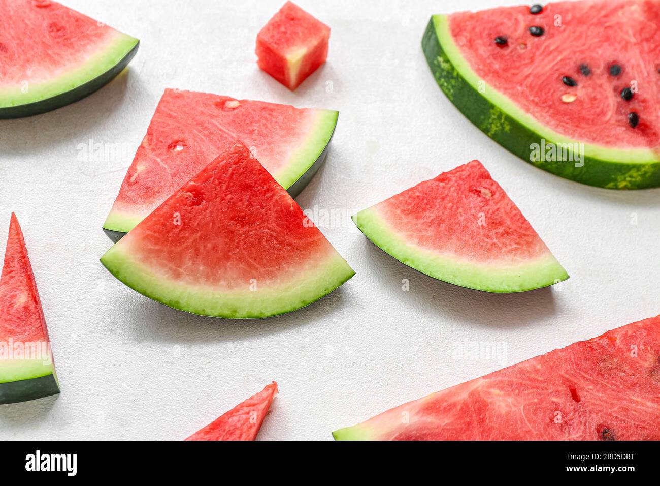 Pieces of fresh watermelon on white background Stock Photo - Alamy