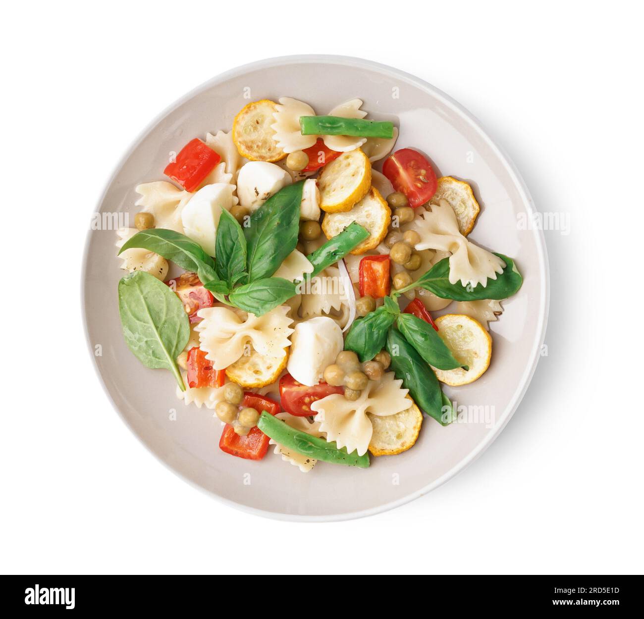 Plate of tasty pasta salad with peas and basil on white background Stock Photo Alamy