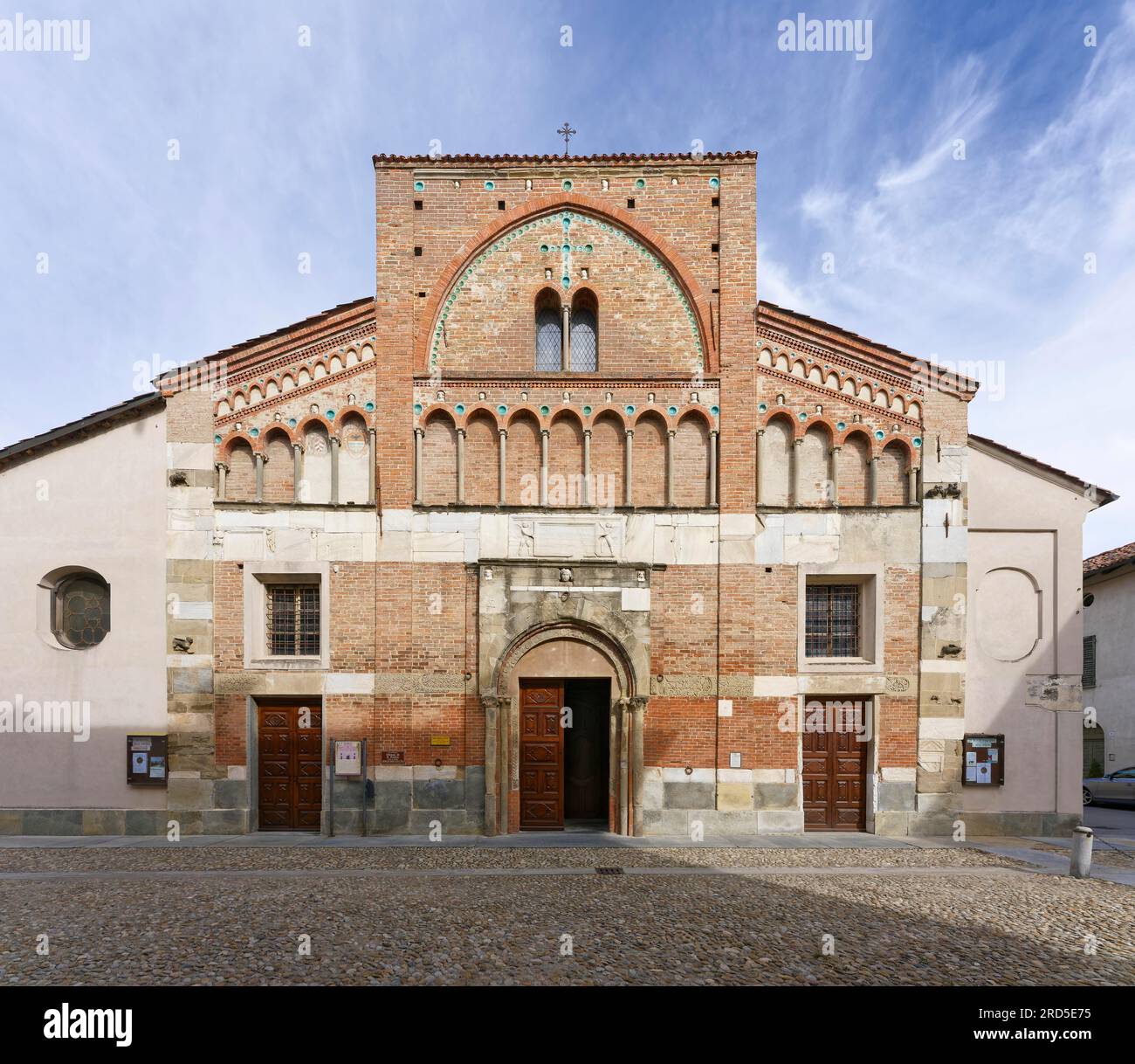 Facade with Roman spolia, Church of San Pietro, Cherasco, Province of Cuneo, Langhe, Piedmont, Italy Stock Photo