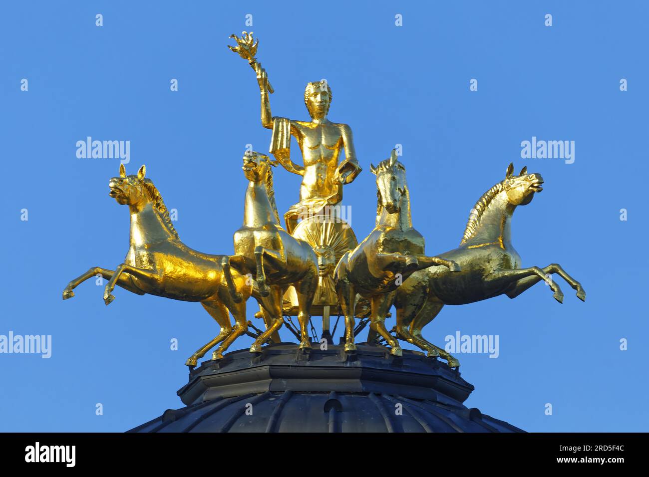 Quadriga on roof, gilded, Apollo, god of light on four-in-hand chariot, four horses, carrying torch as symbol of the sun, temple of the sun Stock Photo