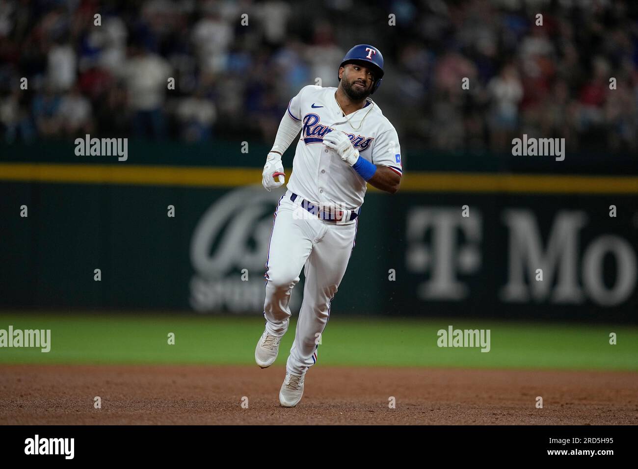 Texas Rangers' Ezequiel Duran rounds the bases after hitting a tworun