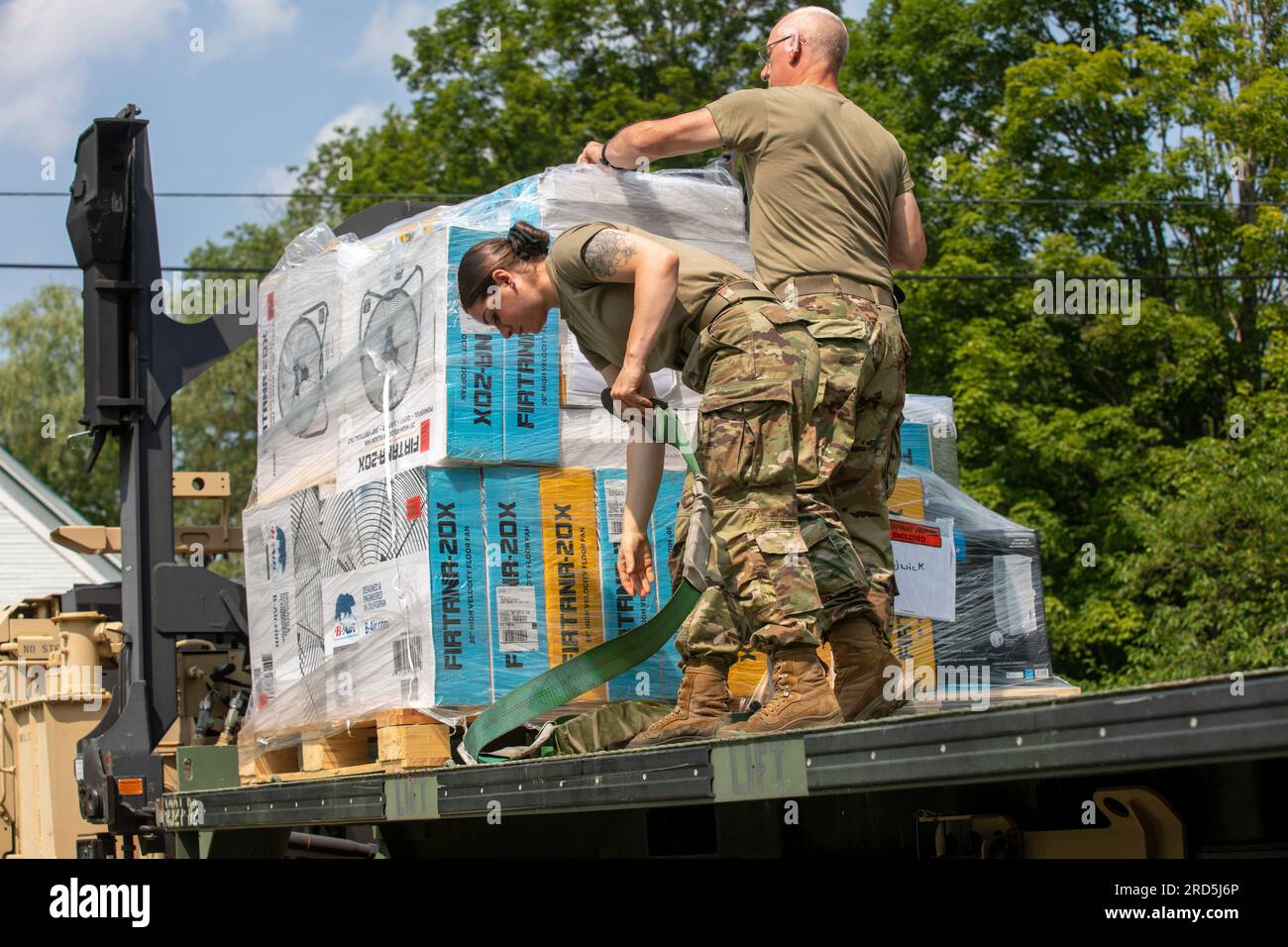 Hardwick, United States Of America. 17th July, 2023. Hardwick, United States of America. 17 July, 2023. U.S. Army Spc. Taylor LaRocque, left, and Staff Sgt. Emil Lemay, right, with the Vermont Army National Guard unload donated electric fans in the aftermath of floods, July 17, 2023 in Hardwick, Vermont. Soldiers helped organize and distribute donated items to towns affected by flooding across Vermont. Credit: Sgt. Denis Nunez/U.S. Army Photo/Alamy Live News Stock Photo
