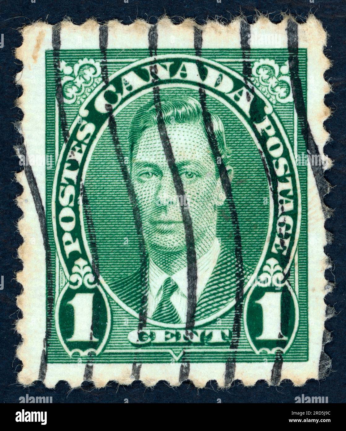 George VI (Albert Frederick Arthur George; 1895 – 1952), King of the United Kingdom and the Dominions of the British Commonwealth from 1936 until his death in 1952. Postage stamp issued in Canada in 1937. Stock Photo