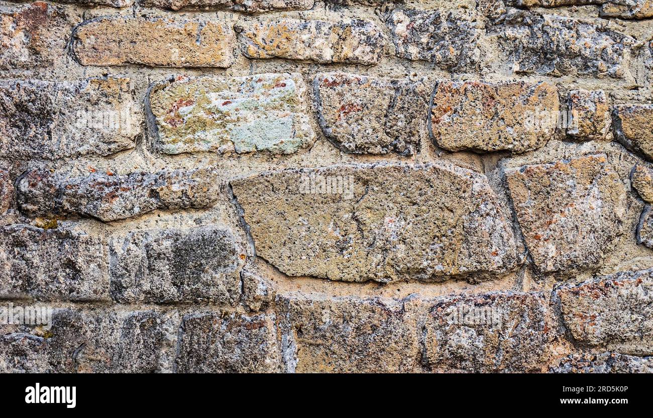 Texture of a stone wall. Old castle stone wall texture background