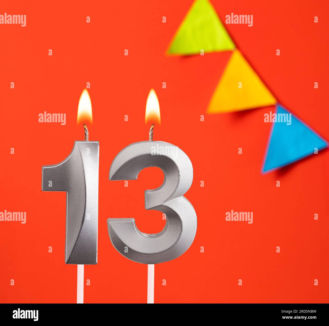 birthday-candle-number-13-invitation-card-in-orange-background-stock