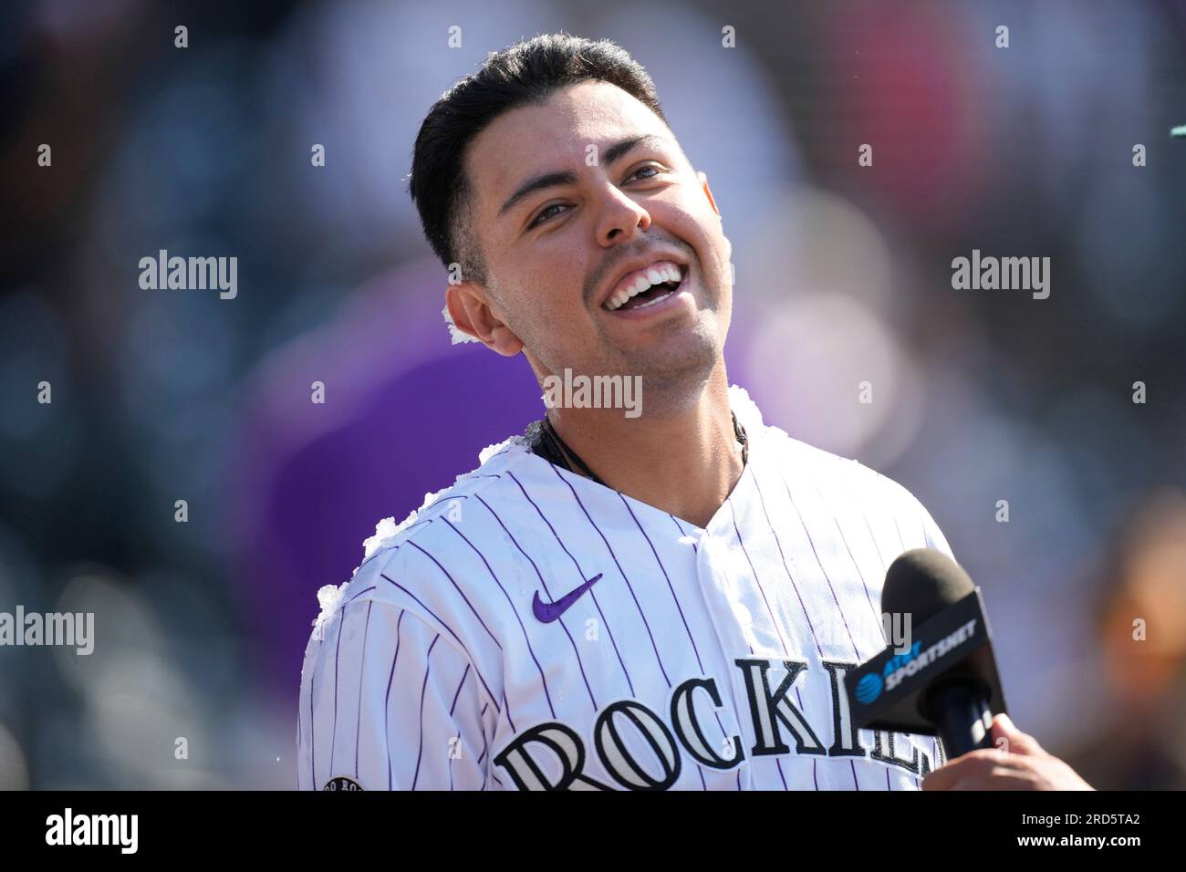 Colorado Rockies second baseman Alan Trejo (13) is doused with ice after  hitting a solo, walk-off home run against New York Yankees relief pitcher Ron  Marinaccio (97) in the 11th inning of