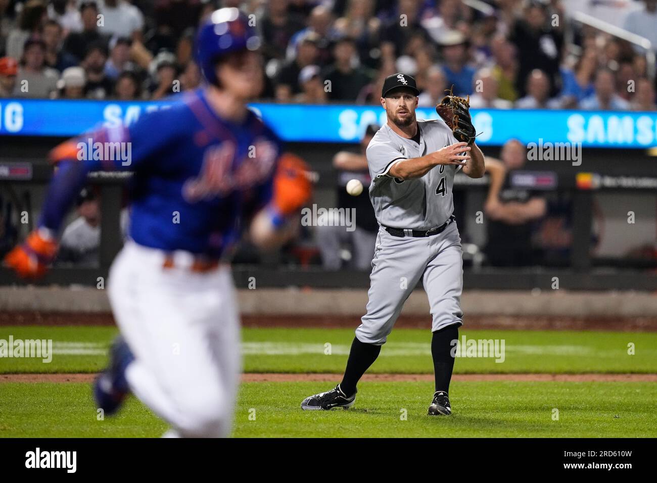 Chicago White Sox relief pitcher Bryan Shaw, right, throws out New
