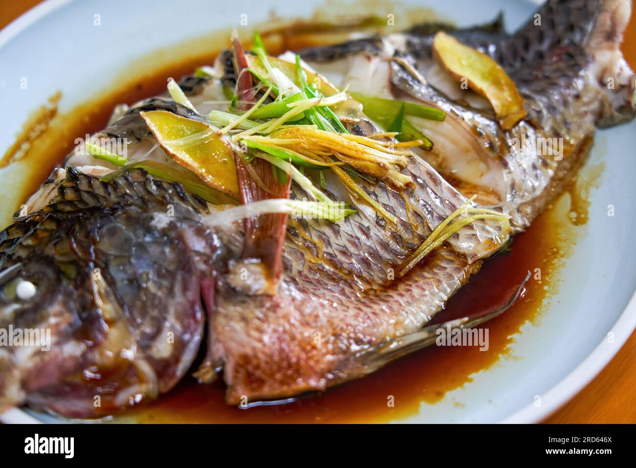 A delicious steamed tilapia dish Stock Photo - Alamy