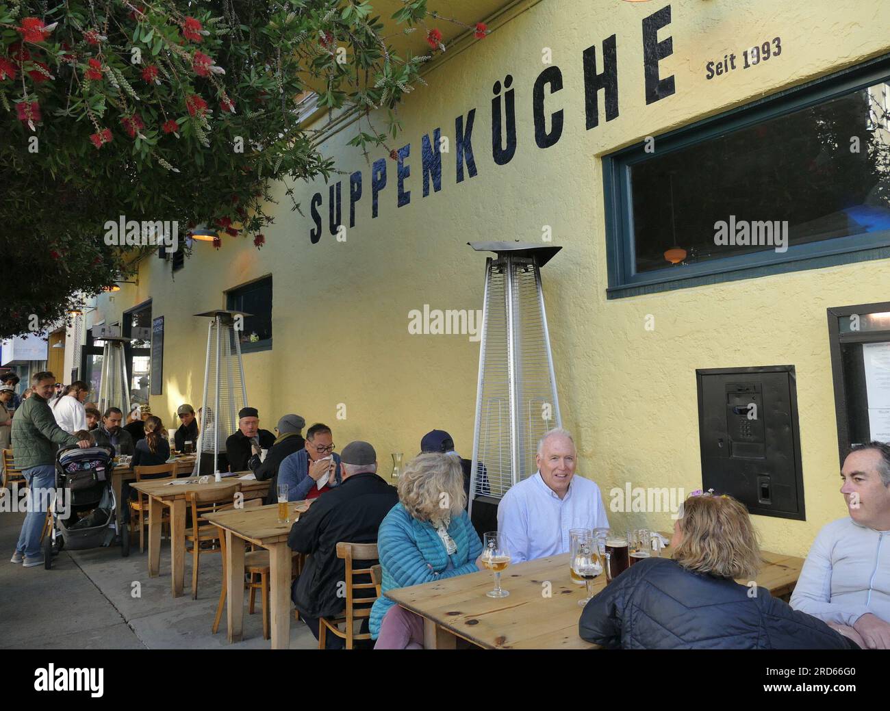 San Francisco, USA. 29th June, 2023. Guests sitting in the outdoor area of the German restaurant 'Suppenküche'. San Francisco is known for its many cuisines and restaurants. Of all places, two Bavarians open a pub there - that was 30 years ago. The 'Suppenküche' is still a success story today. (to dpa: '30 years of 'Suppenküche' - with sausage and beer in San Francisco to success') Credit: Barbara Munker/dpa/Alamy Live News Stock Photo