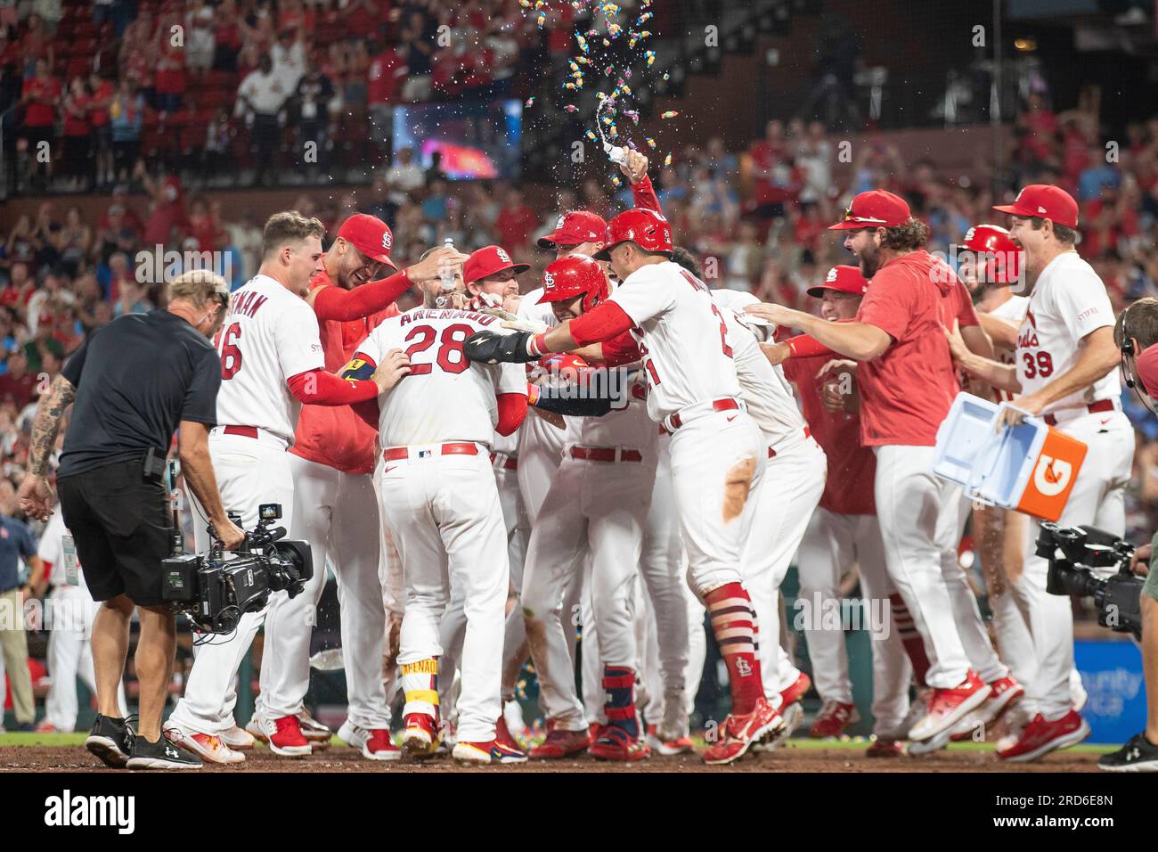 St. Louis Cardinals David Freese is mobbed by teammates including