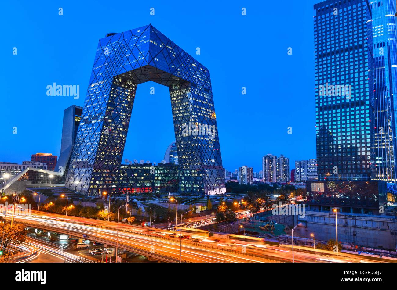 Beijing,China - October 31, 2019:A famous landmark building China CCTV (CCTV) and China Zun Citic Tower at twilight time Stock Photo