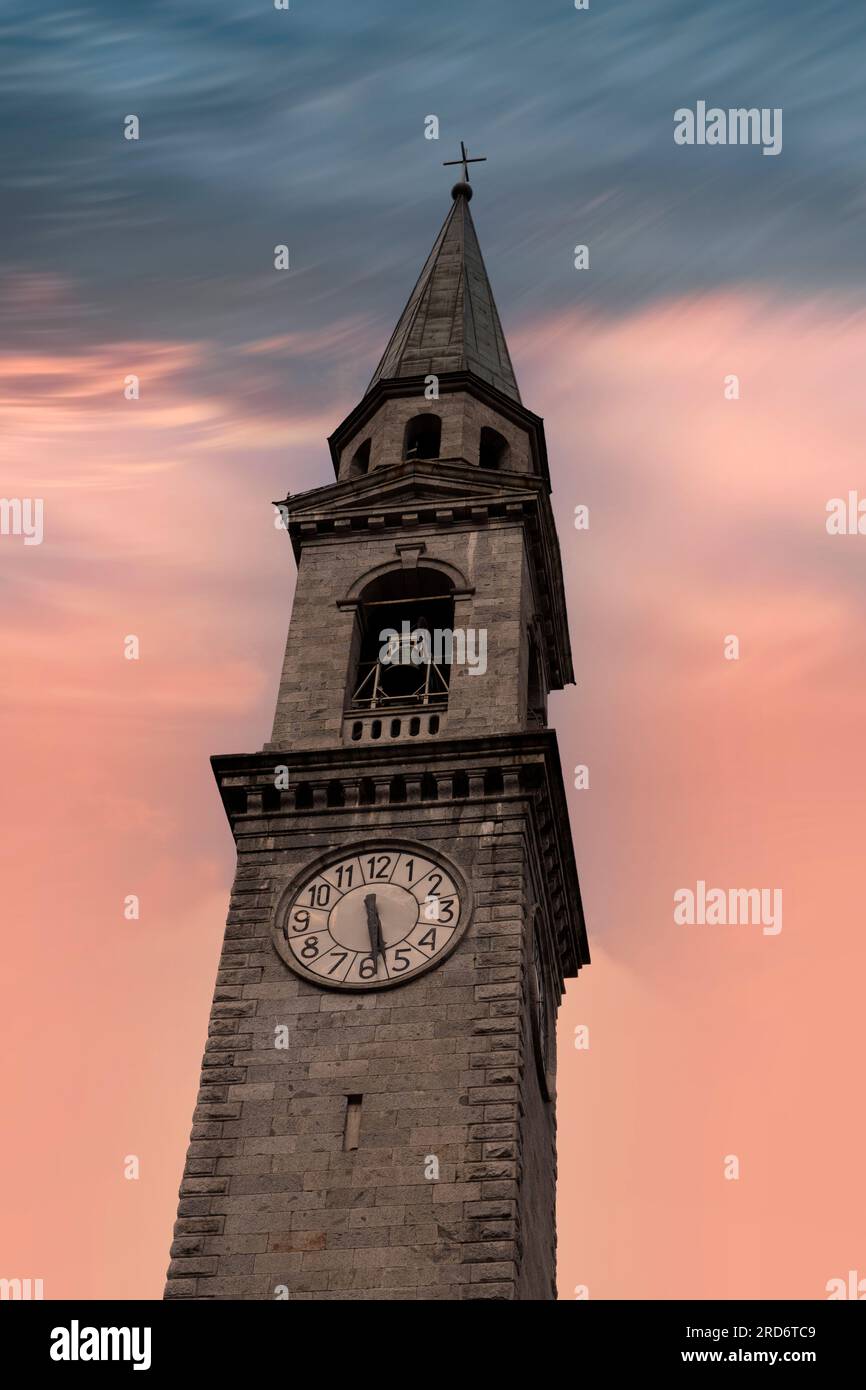 bell tower of the church of san lorenzo in the town of pinzolo trentino Stock Photo