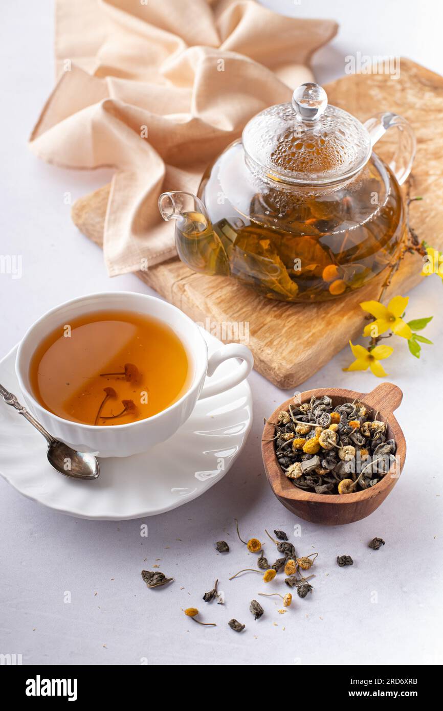 Green Tea And chamomile - Brewed Tea with teapot Stock Photo