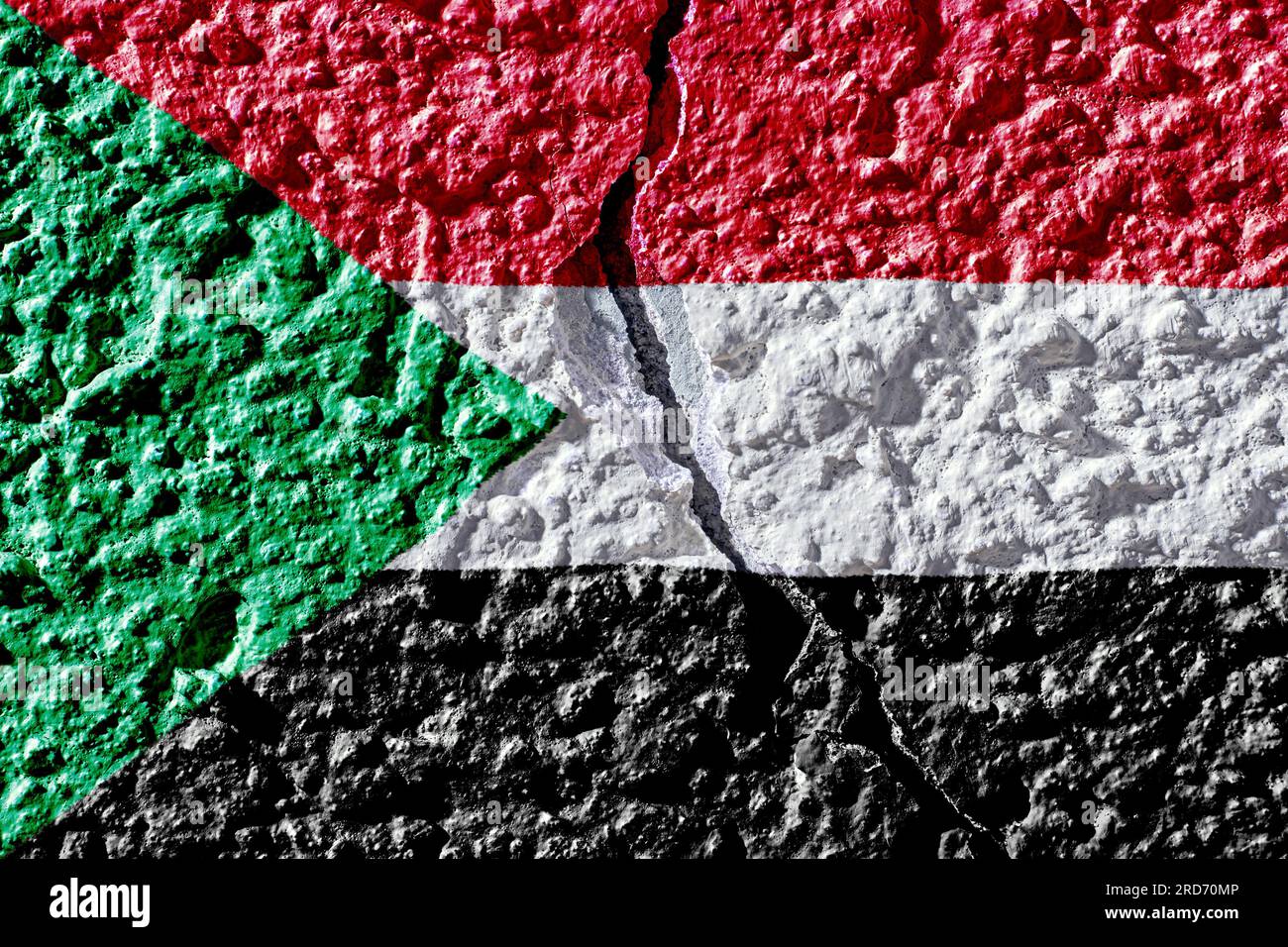 Flag of Sudan on the background of a plastered wall with a crack. Military insurgency and civil war in Sudan Stock Photo