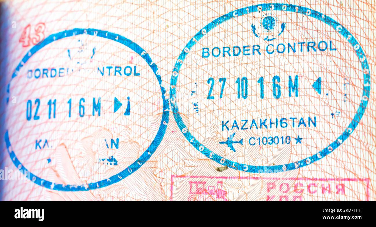 Kazakhstan border crossing stamps. Kazakhstan entry visa stamp. Kazakh exit visa stamp 2016 Stock Photo