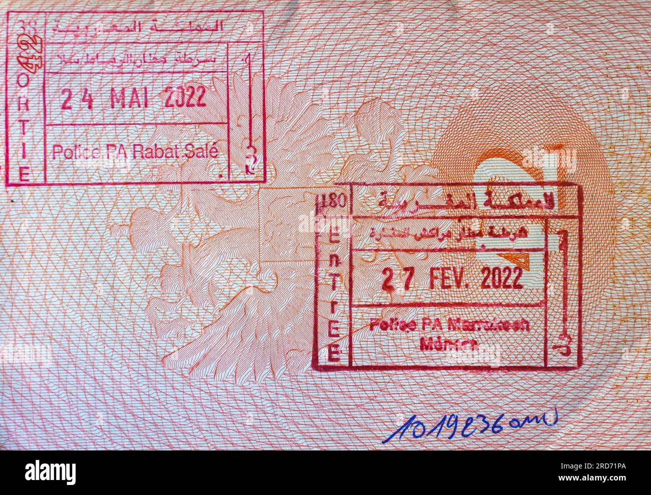 Moroccan border crossing stamps.  Marrakech-Menara Airport border  entry point in an open passport. Rabat Sale exit stamp Morocco Stock Photo
