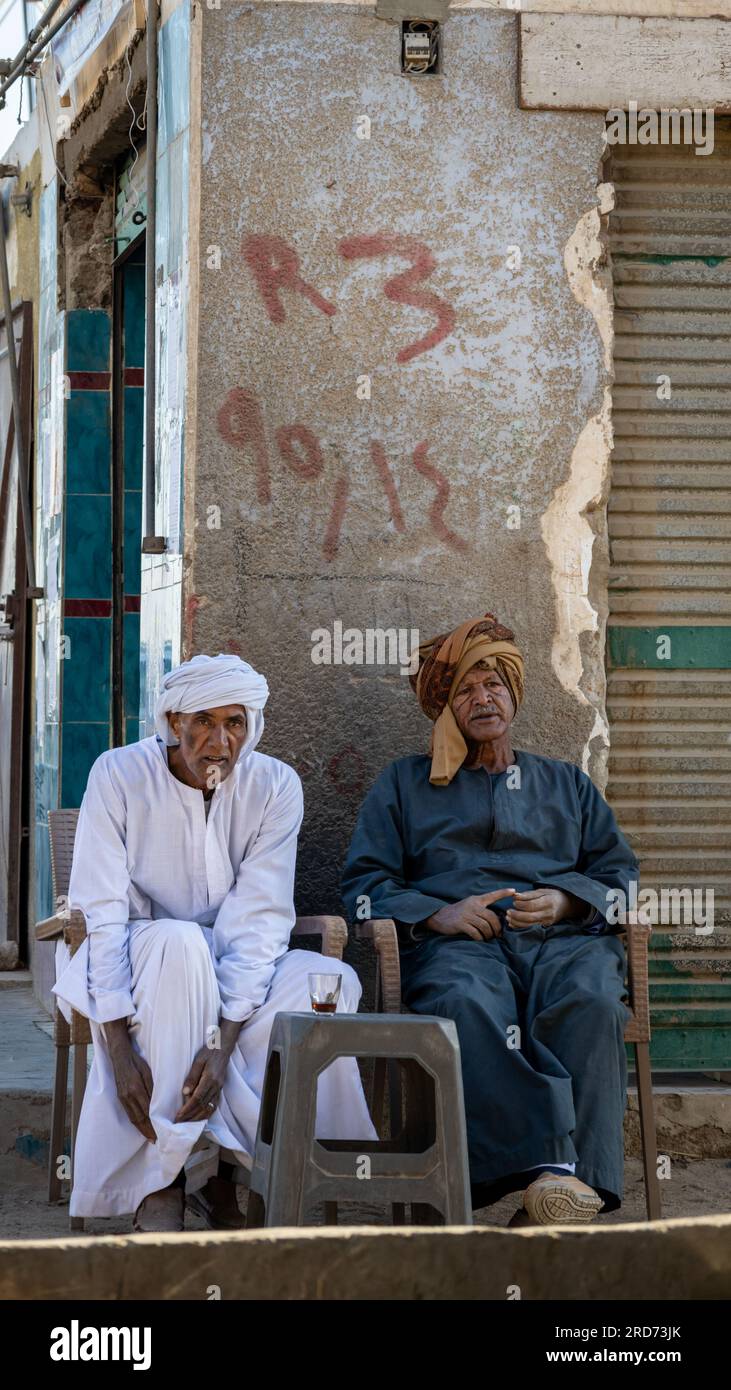 Men sitting outside a cafe in Egypt, Aswan Stock Photo