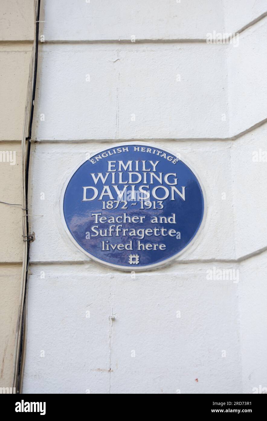 english heritage blue plaque marking a home of teacher and suffragette emily wilding davison, west kensington, london, england Stock Photo