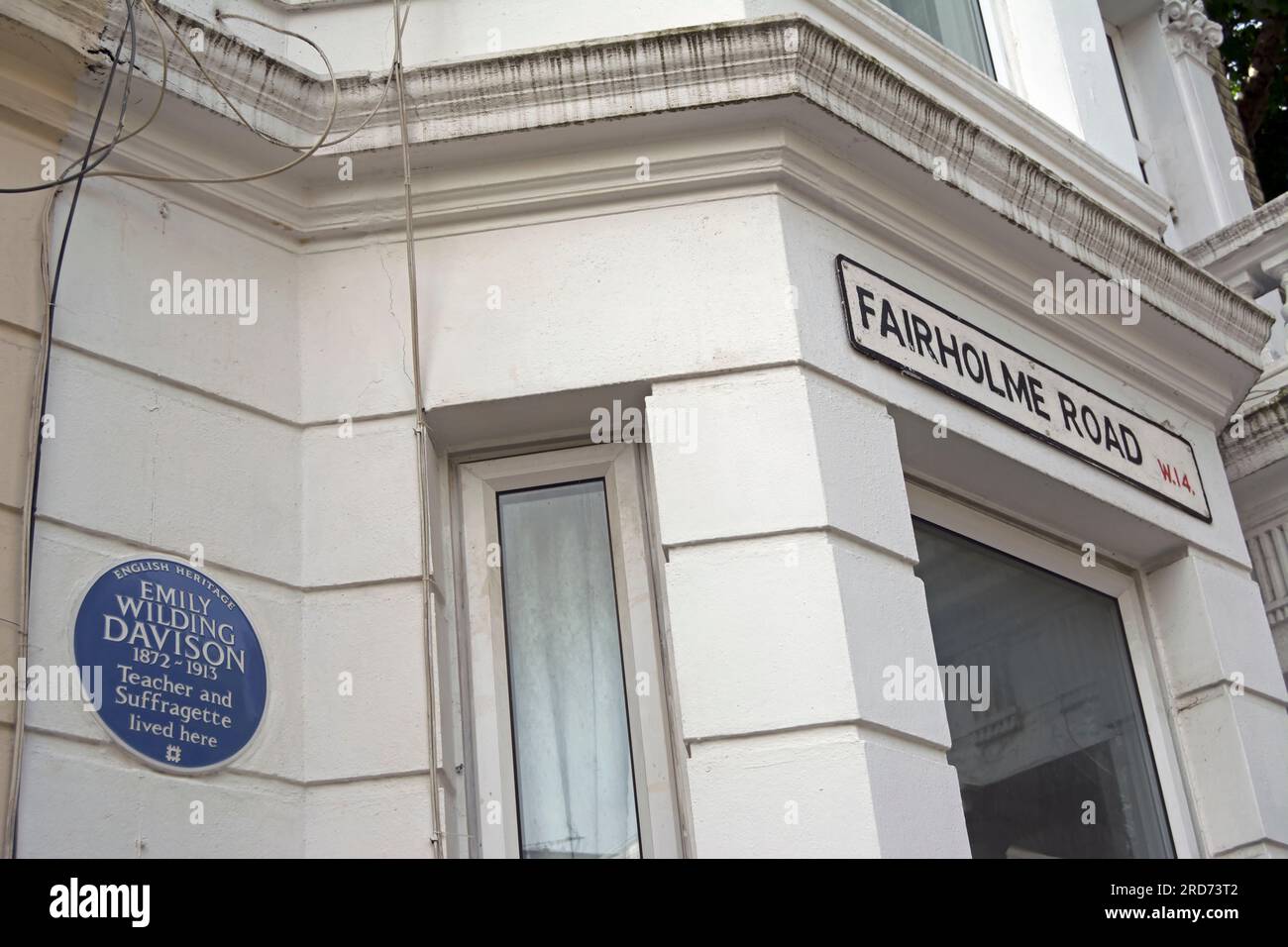 english heritage blue plaque marking a home of teacher and suffragette emily wilding davison, west kensington, london, england Stock Photo