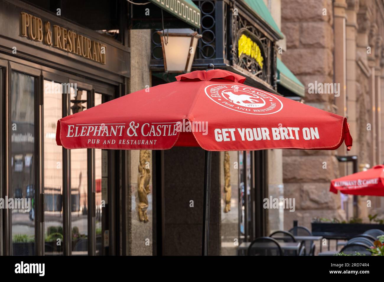 Red Patio Umbrella Outside The Elephant & Castle Pub Restaurant In