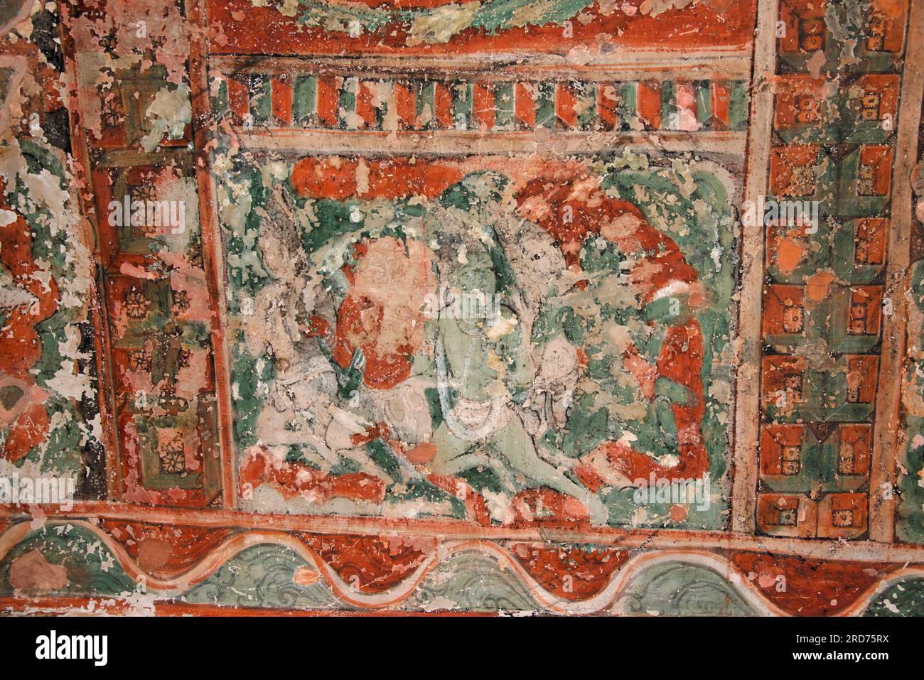 Ellora - General-View of  the Brahmanical caves above the Jain group. Painting-Picture shows flying figures on the ceiling in veranda. Aurangabad, Ind Stock Photo