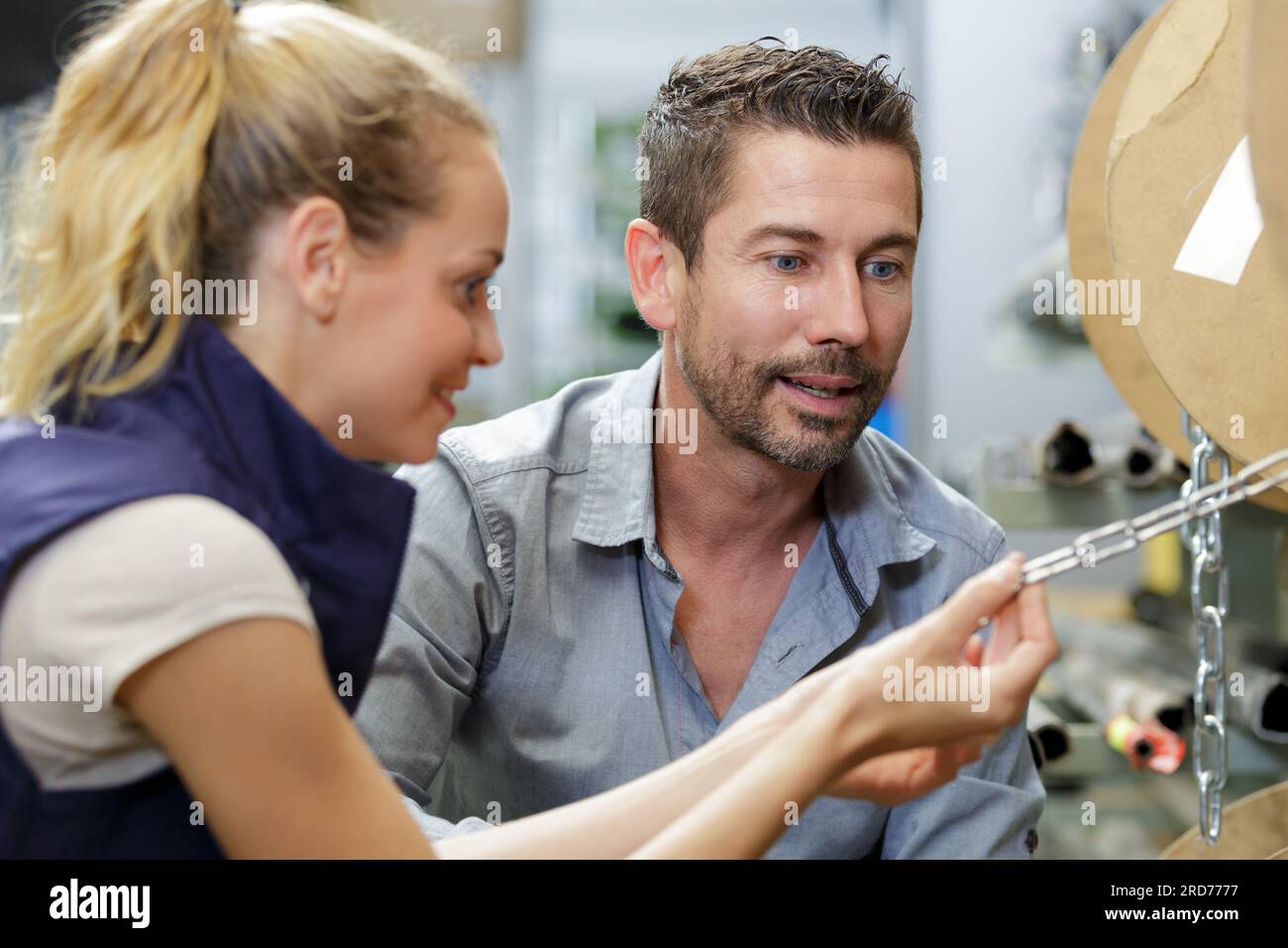 woman and man a chain hardware store Stock Photo Alamy