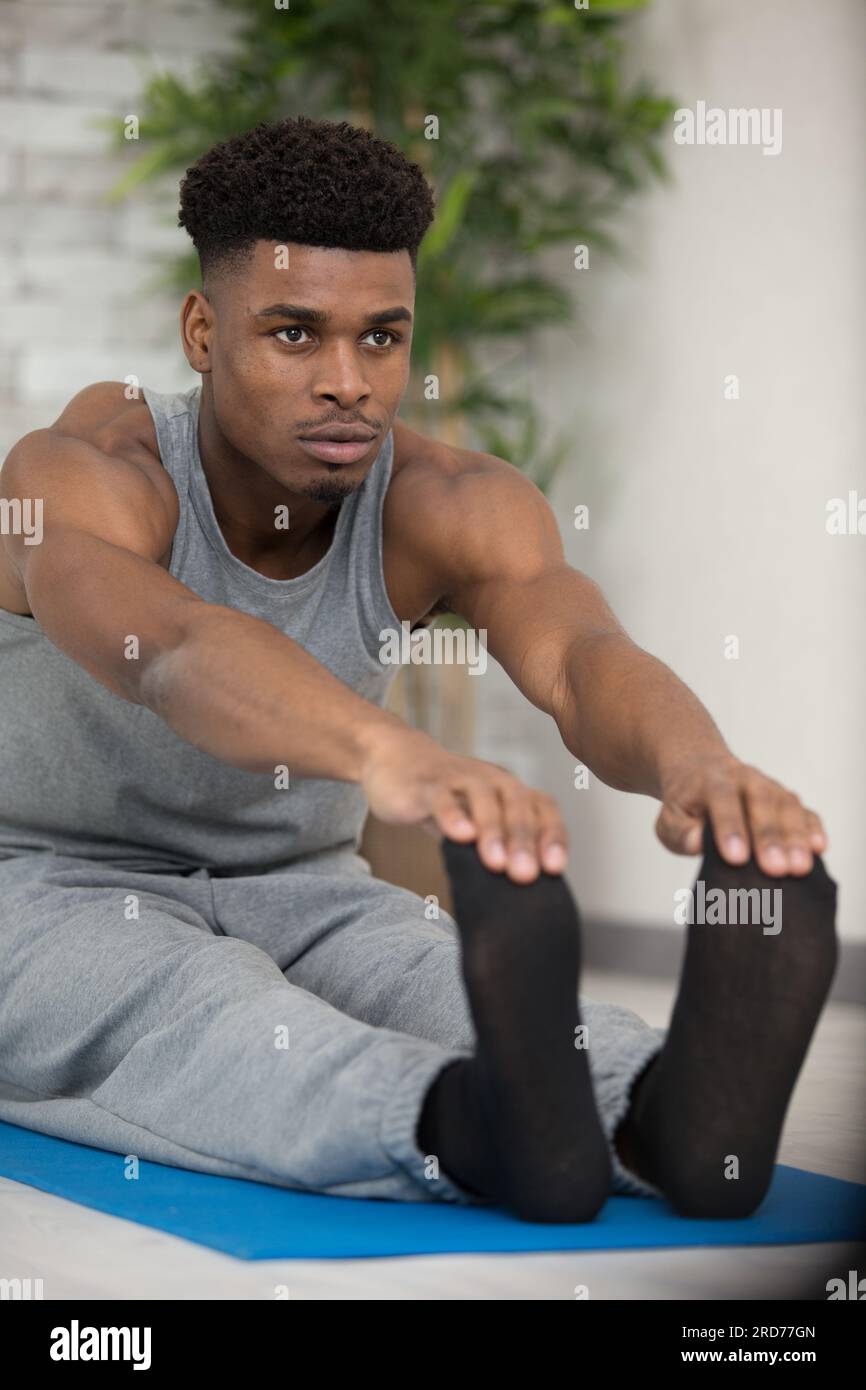 Sport exercises home man warm hi-res stock photography and images - Alamy