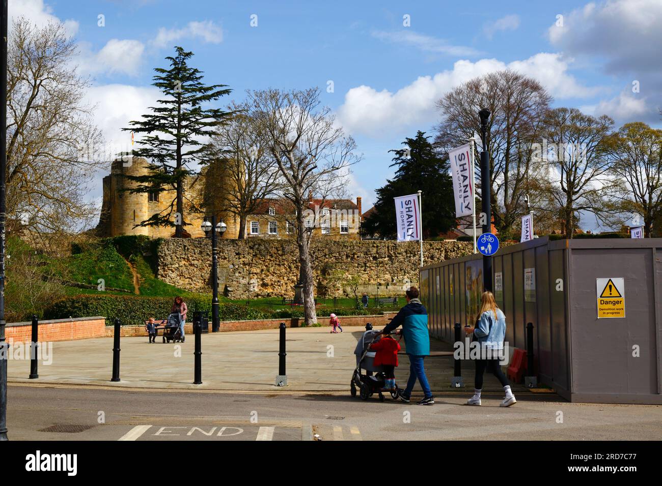 River Walk and corner of construction site for new Shanly Homes River Walk housing complex, castle gatehouse in background, Tonbridge, Kent, England Stock Photo