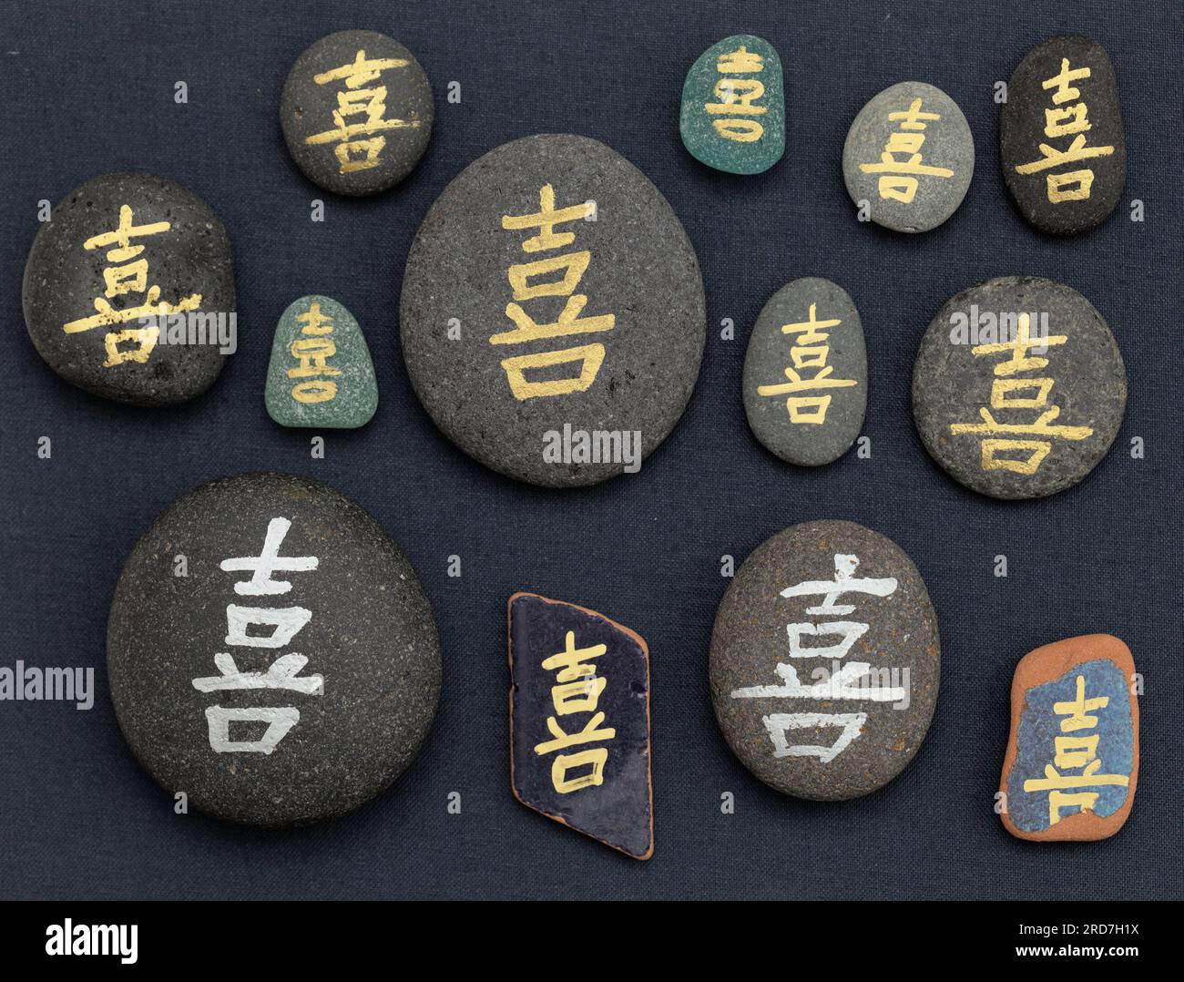 Chinese character xi or Japanese ki, meaning joy, written on a volcanic