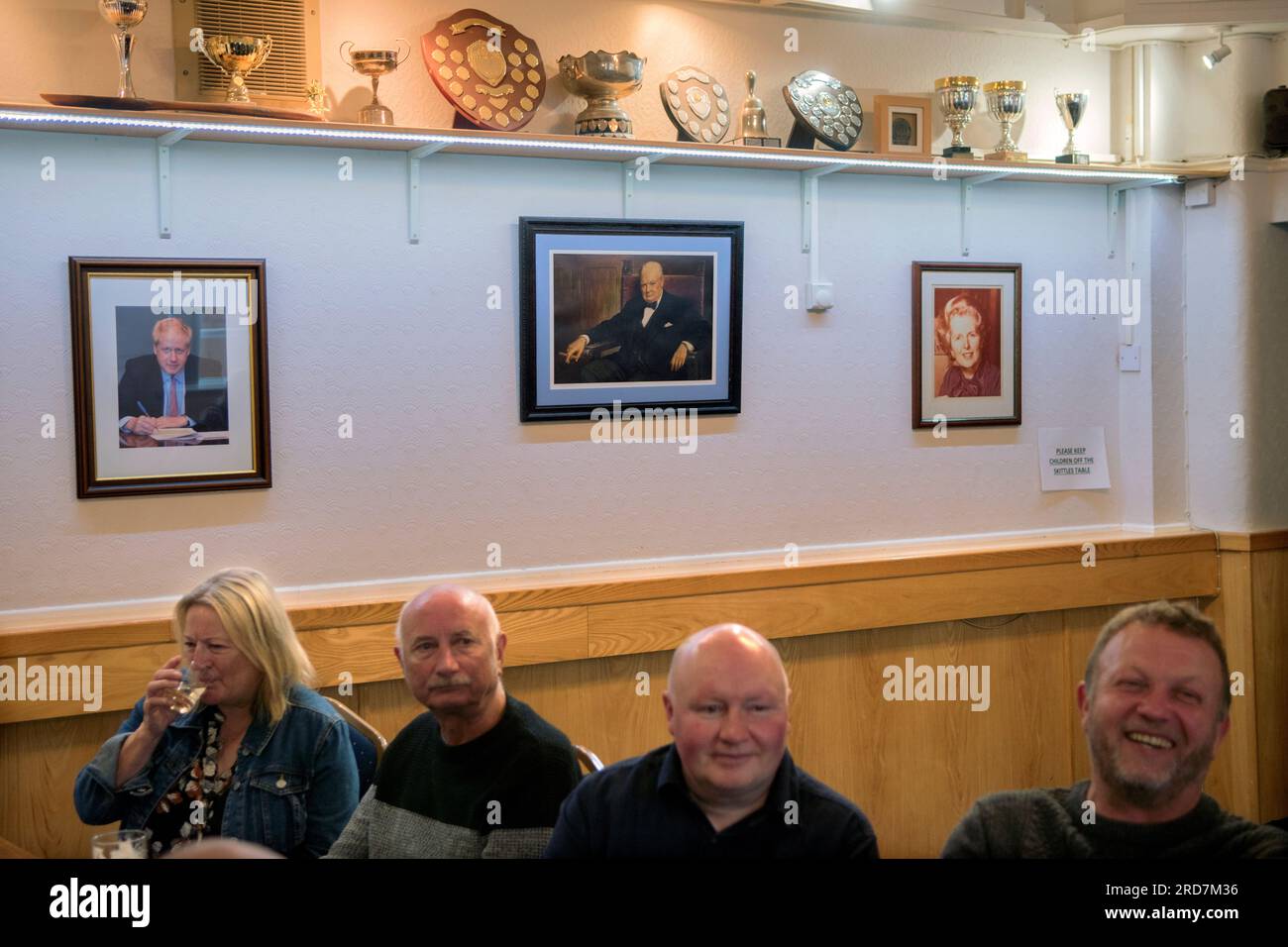 Conservative Party Club members. The Conservative Club in the Kettering Constituency  photographs of Conservative Prime Ministers, Borris Johnson, Winston Churchill, Margaret Thatcher on the wall. Rothwell, Northamptonshire, England 5th June 2023 2020s UK HOMER SYKES Stock Photo
