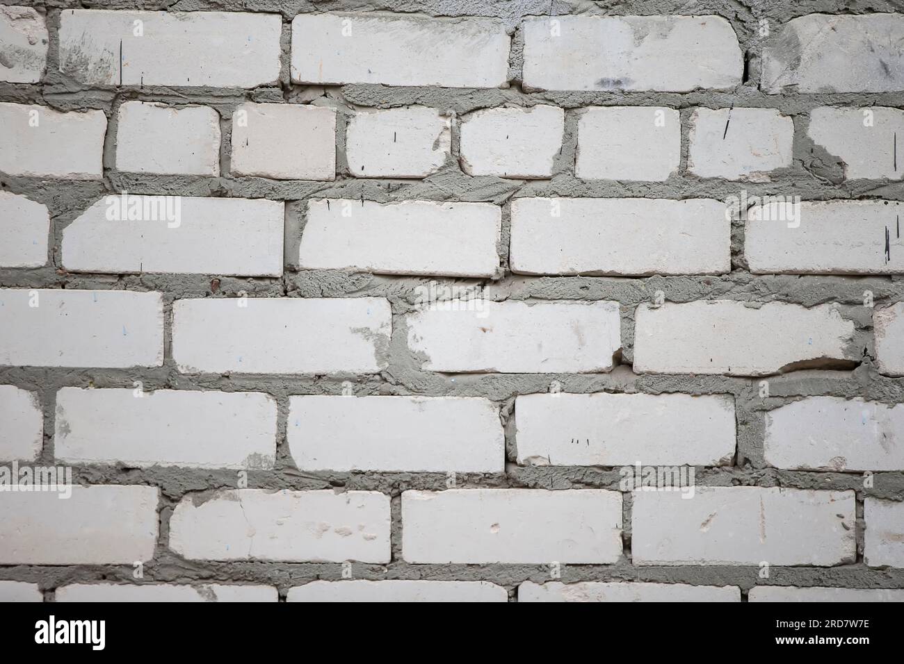 Texture of an old brick wall with gray plaster Stock Photo - Alamy