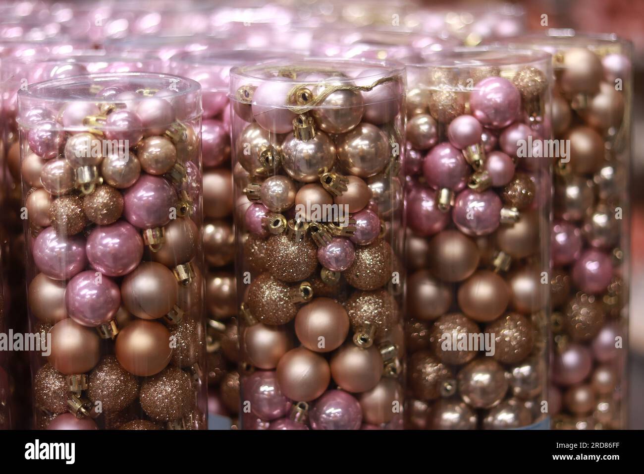 Christmas balls in packages, matte and glossy Christmas decorations. Sale of decor for the New Year or Christmas. Stock Photo