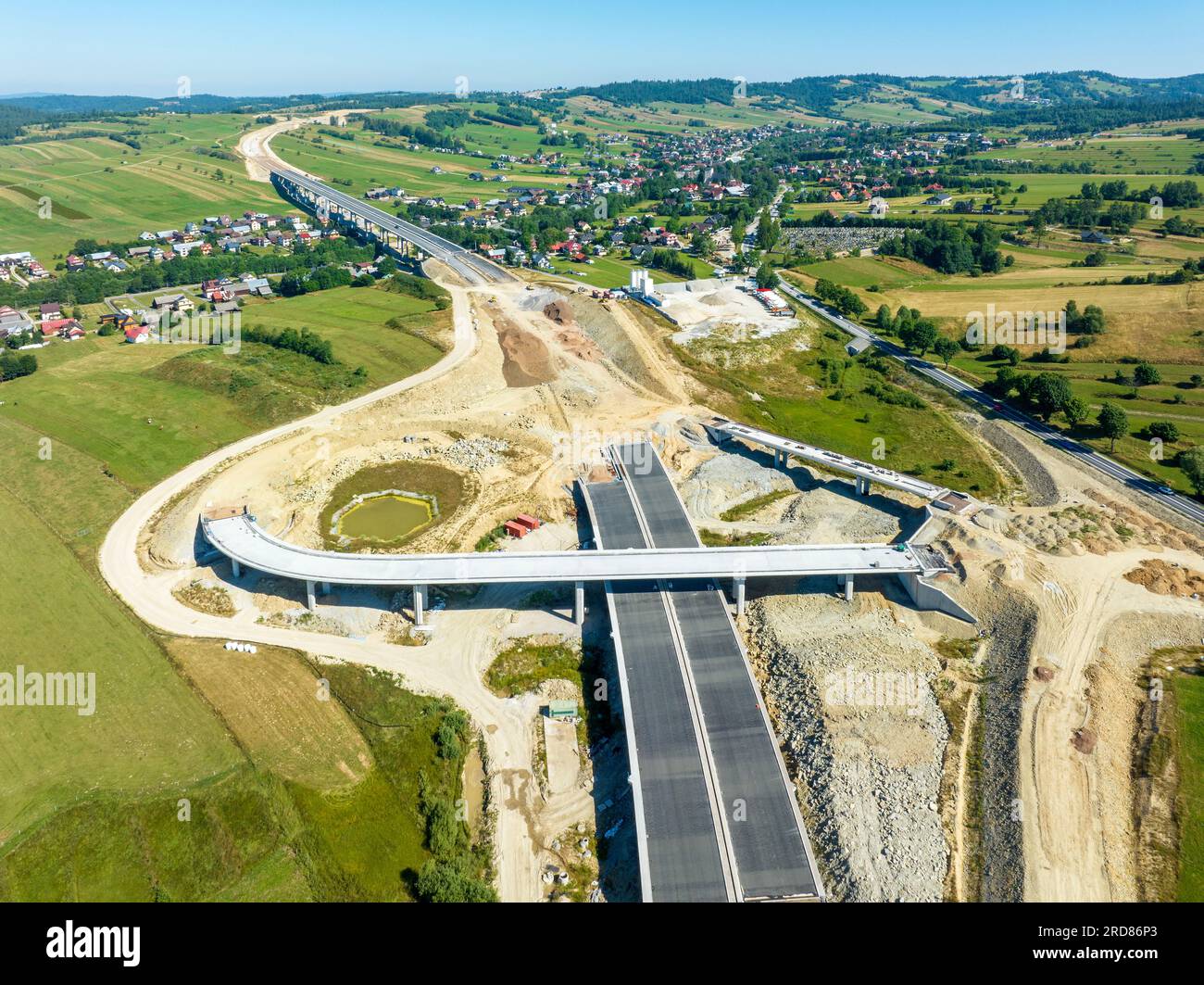 New fragment of highway under construction on Zakopianka road in Poland from Rdzawka to Nowy Targe over Klikuszowa, main place of traffic jams. State Stock Photo
