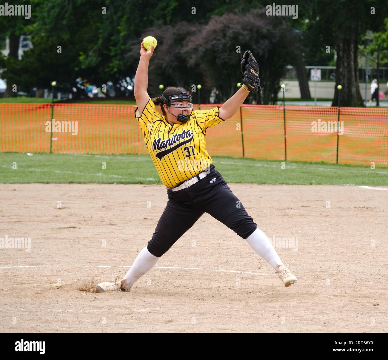 NAIG 2023 Softball tournament- u19 Female Manitoba Pitcher in the windup of her pitch delivery. Halifax July 2023 Stock Photo