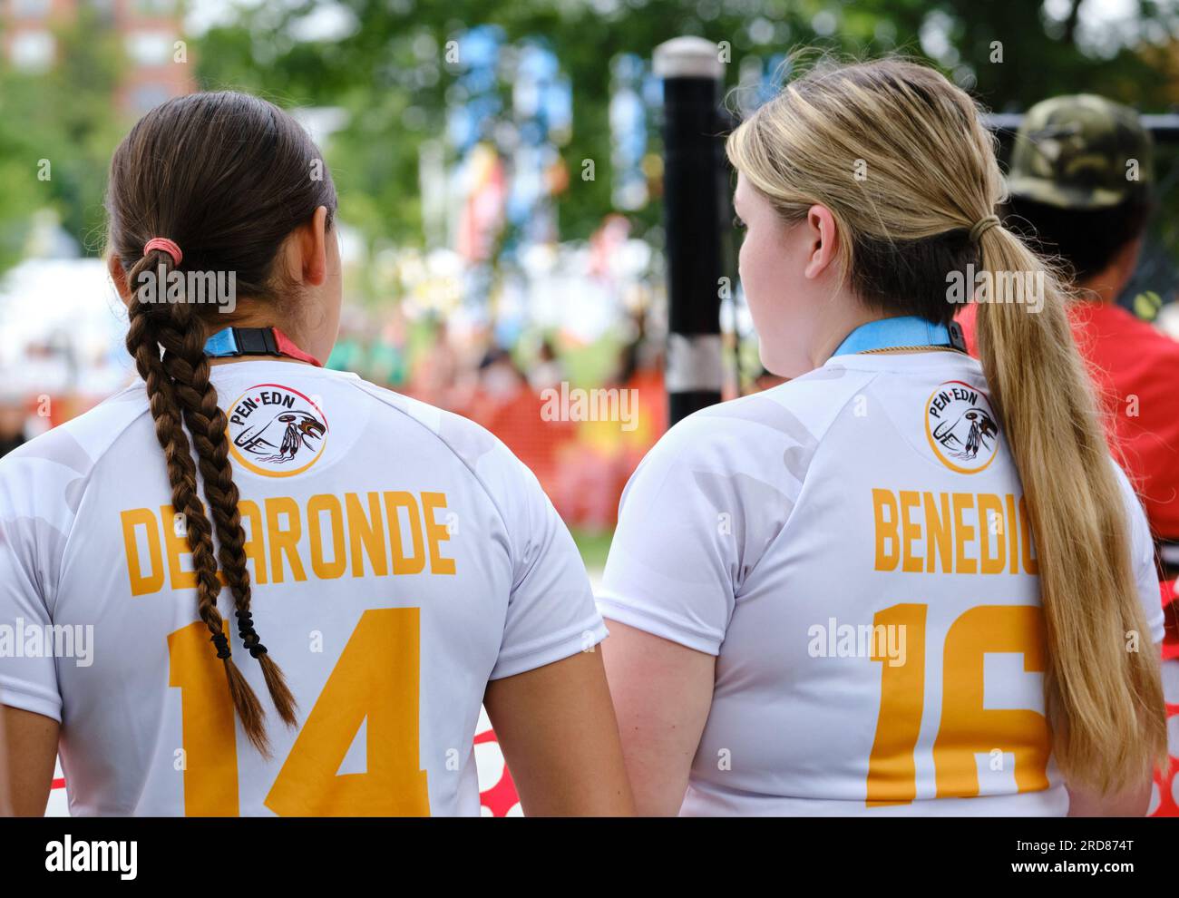 NAIG 2023 Softball tournament- two female players from team EDN from back with name on jersey. Halifax July 2023 Stock Photo