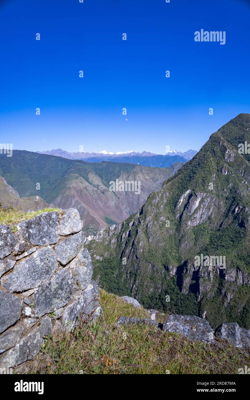 view west from Inca ruins of Machu Picchu towards Urubamba river valley and Pumasillo mountain, Peru, South America Stock Photo